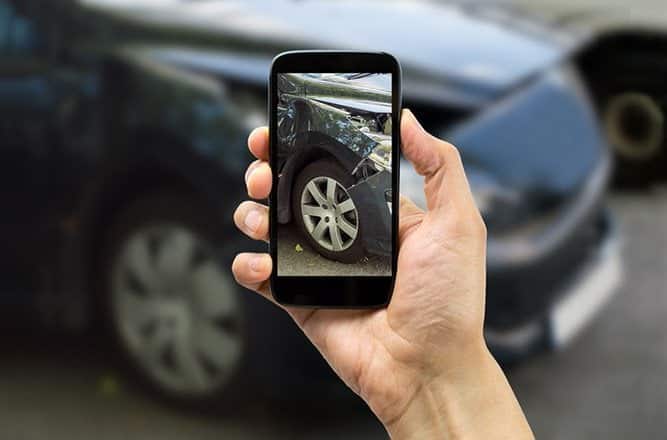 Car Involved In Accident Photo On Phone